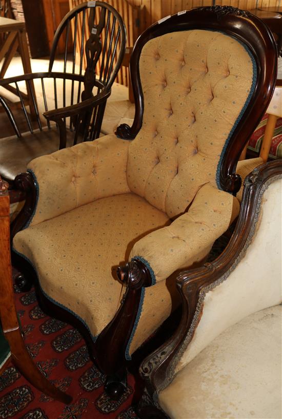 A Victorian mahogany spoonback armchair